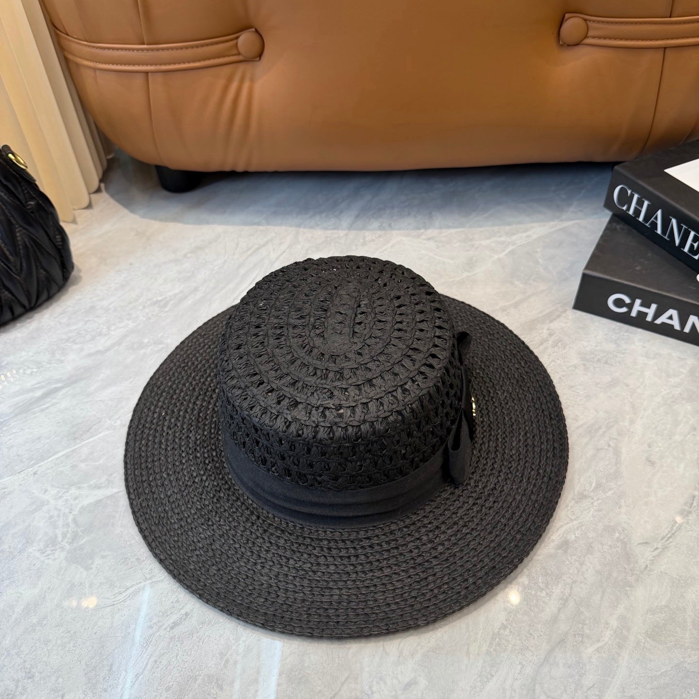 Chanel Straw Hat With Black Ribbon Accent 250043