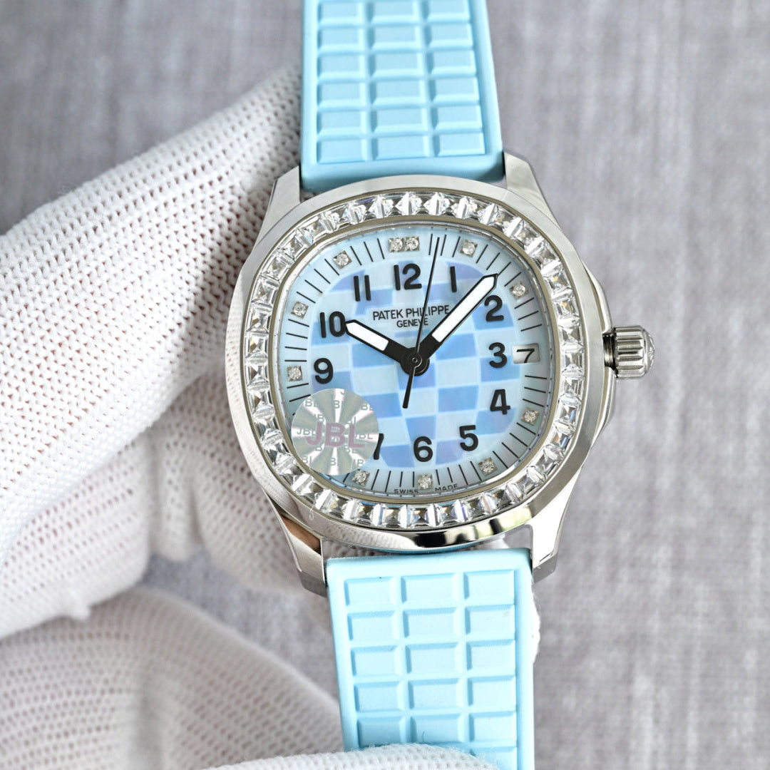 Patek Philippe  Aquanaut 35.6mm Blue Dial Blue Strap Watch