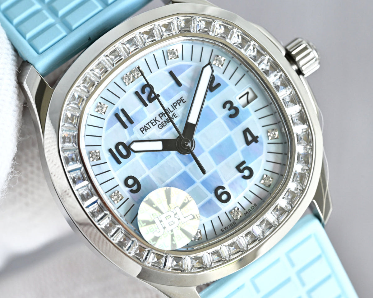 Patek Philippe  Aquanaut 35.6mm Blue Dial Blue Strap Watch