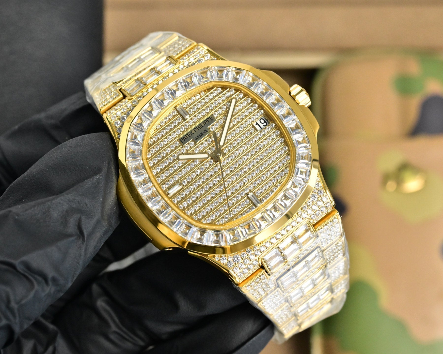Patek Philippe Nautilus 40mm Yellow Gold Baguette Diamonds Watch