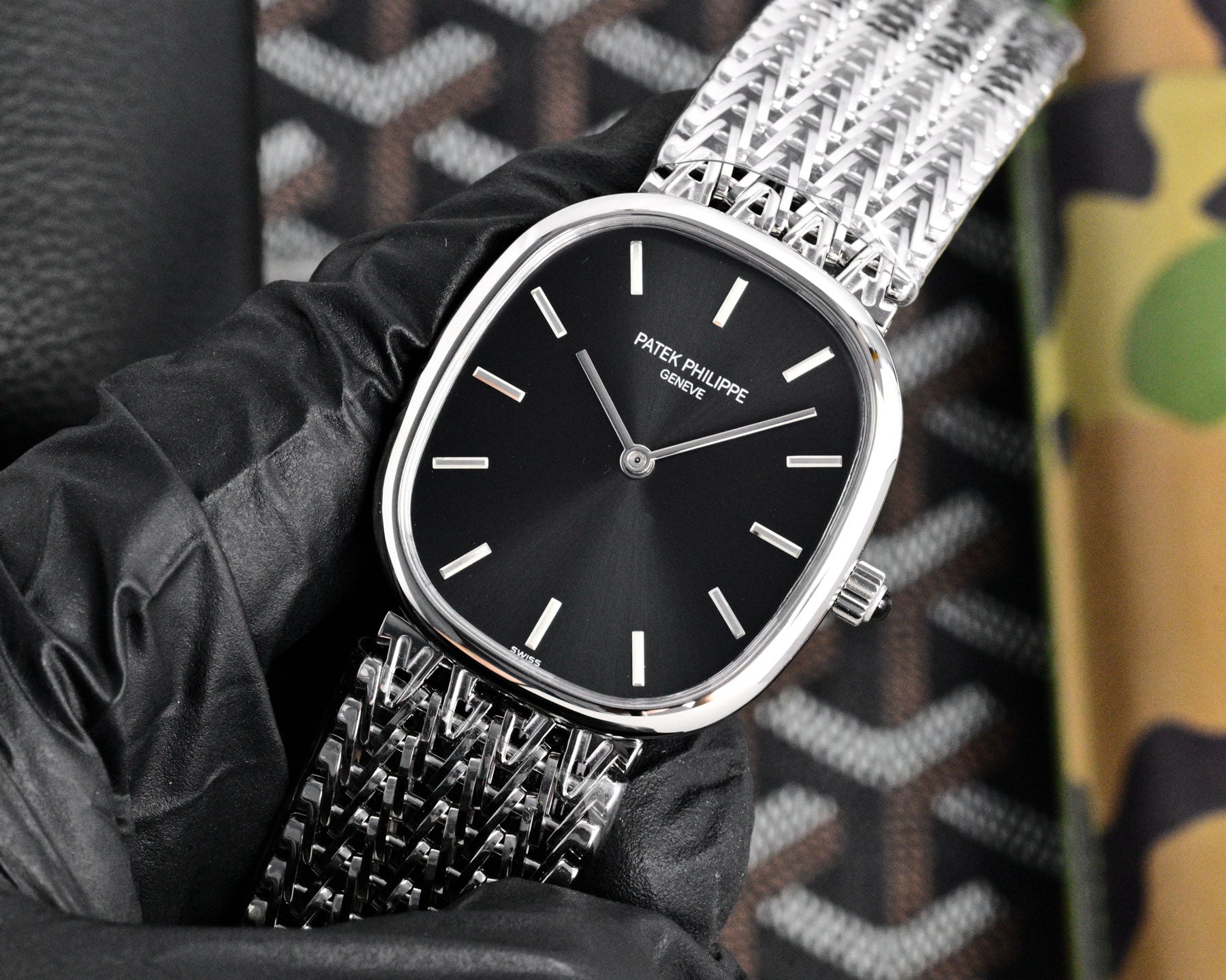 Patek Philippe Golden Ellipse 27mm Black Dial Steel Strap
