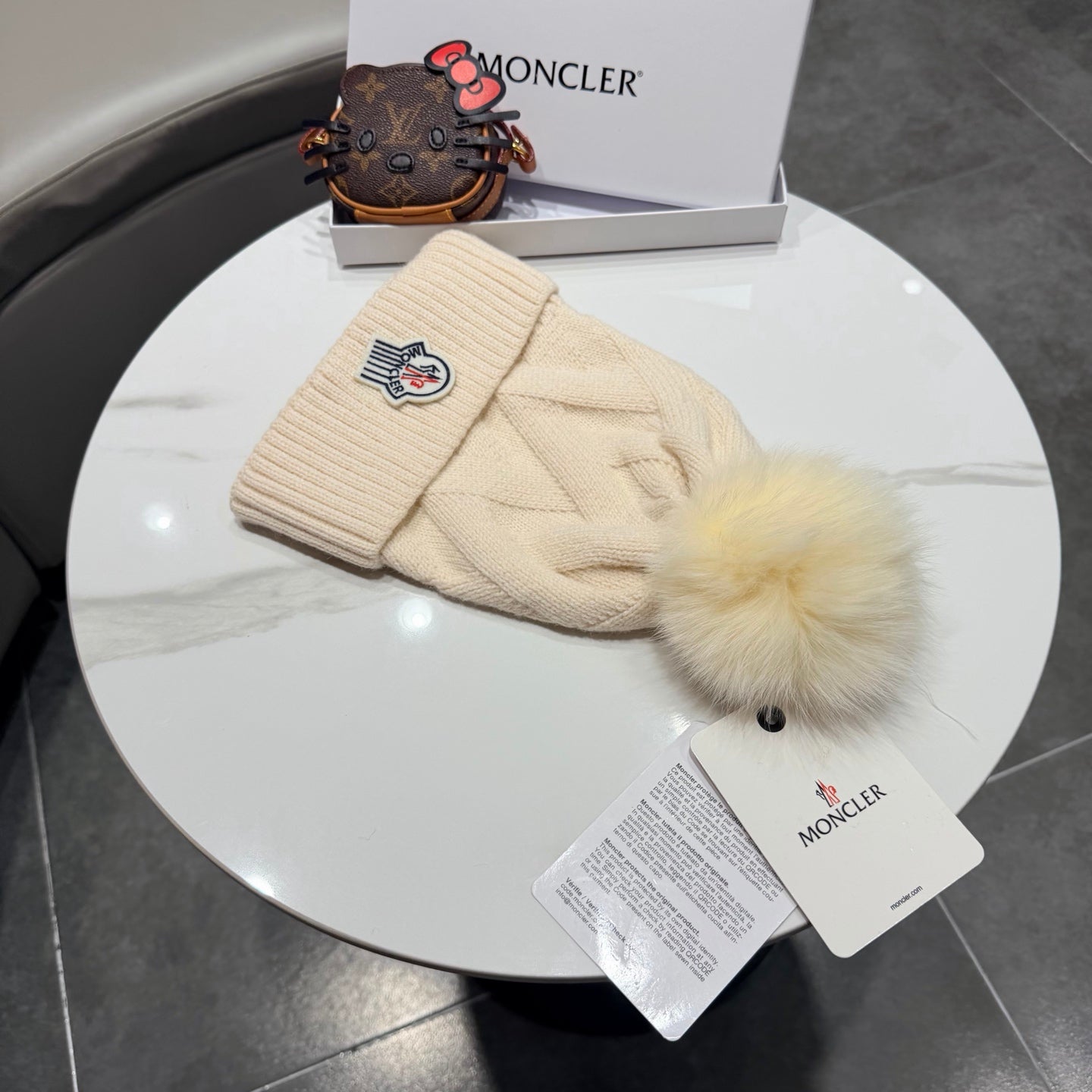 Moncler Wool Hat With Pom-pom 435188
