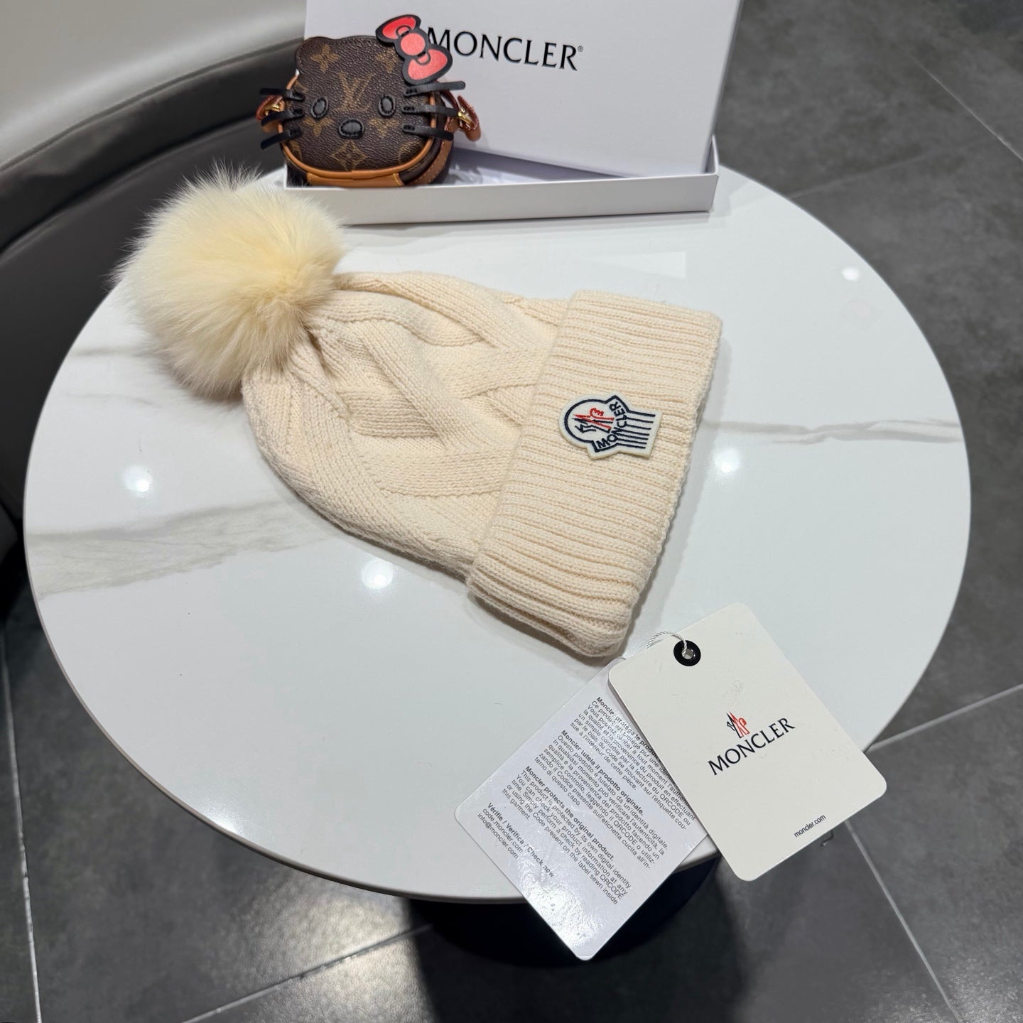 Moncler Wool Hat With Pom-pom 435188