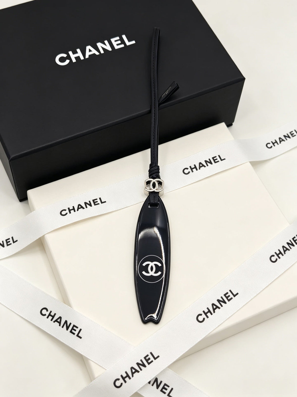 Chanel Surfboard-shaped Leather Cord Charm