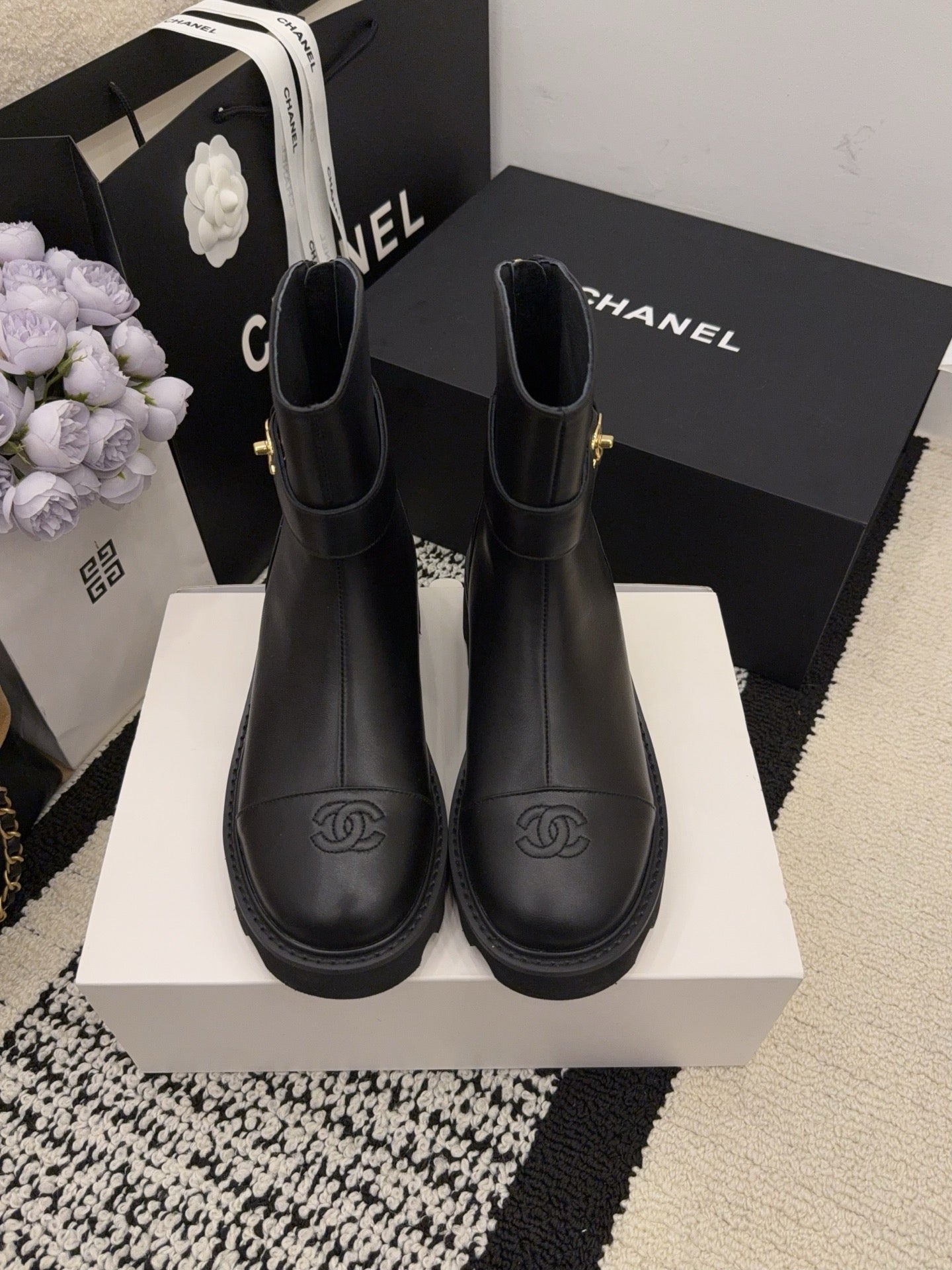 CC 26 Boot With Lug Sole Black Calfskin 588678