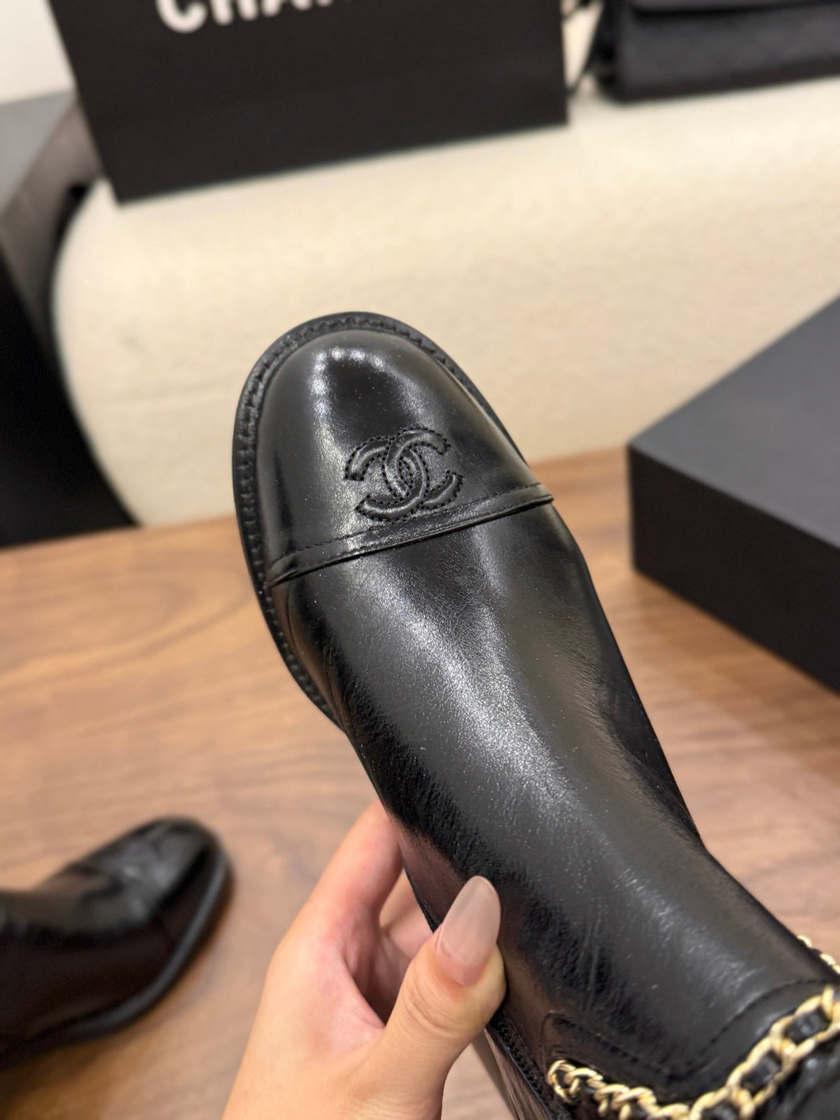 Chanel 2026 Crumped Cap Toe Chain Boots 65mm Leather 173455